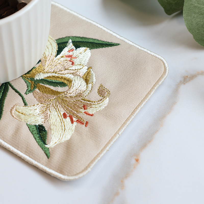 Broderade glasunderlägg